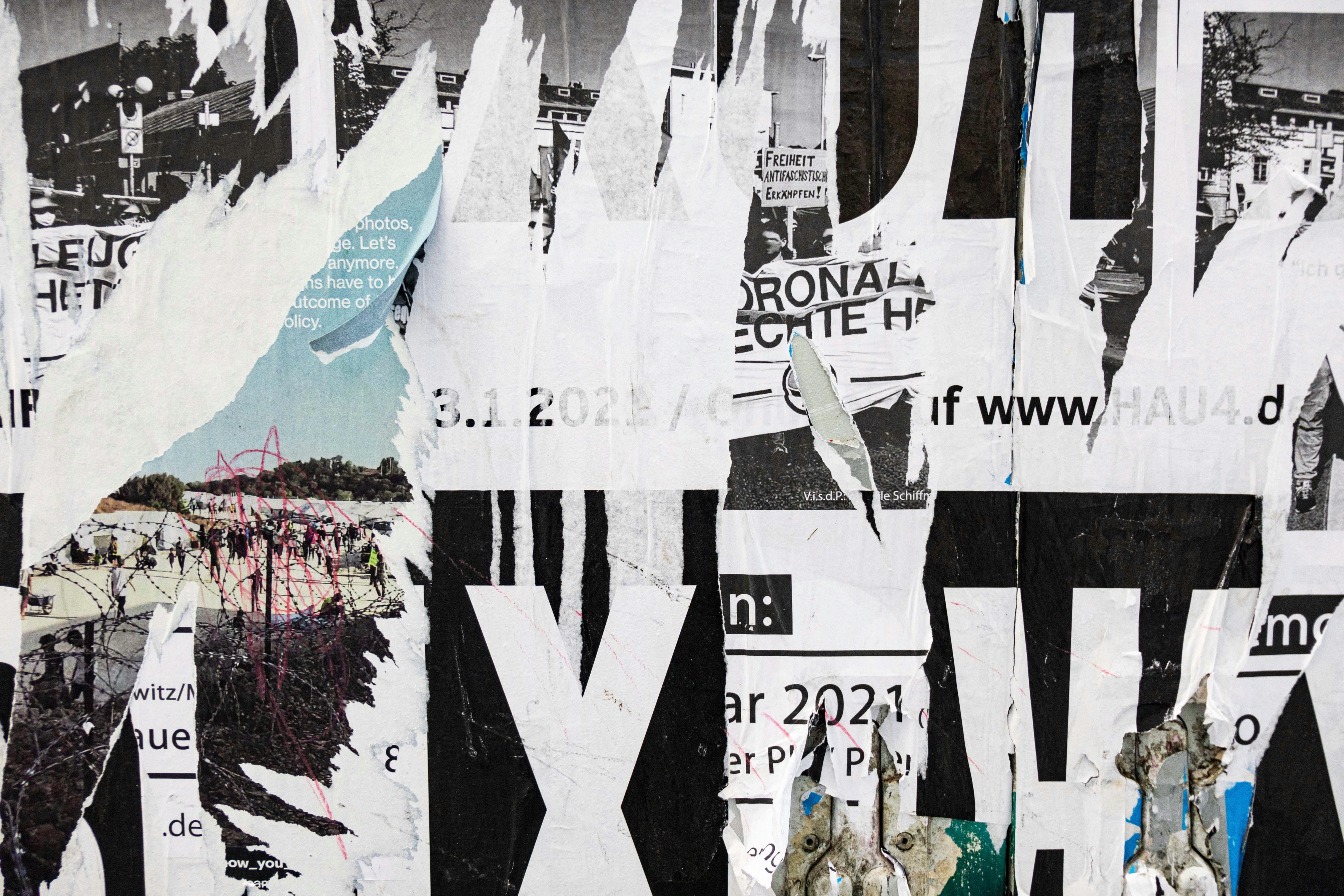 a black and white collage of different papers blending together